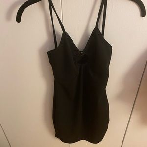 Black mini dress with silver ring in the center